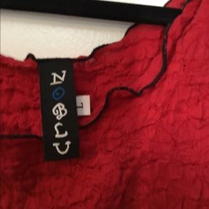 Beautiful red top with black Decorative stitching